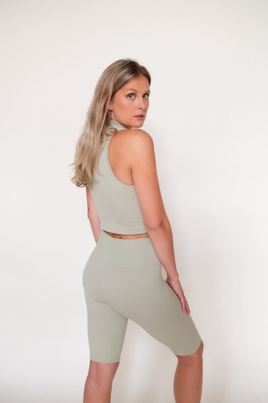 Our sage biker short is seamless, ribbed and sustainable. It's the perfect bottom to wear on a daily basis at home, to the gym or even outside with and oversized shirt or a crop top.