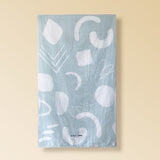 This blue sustainable beach towel is big enough to fit two persons.