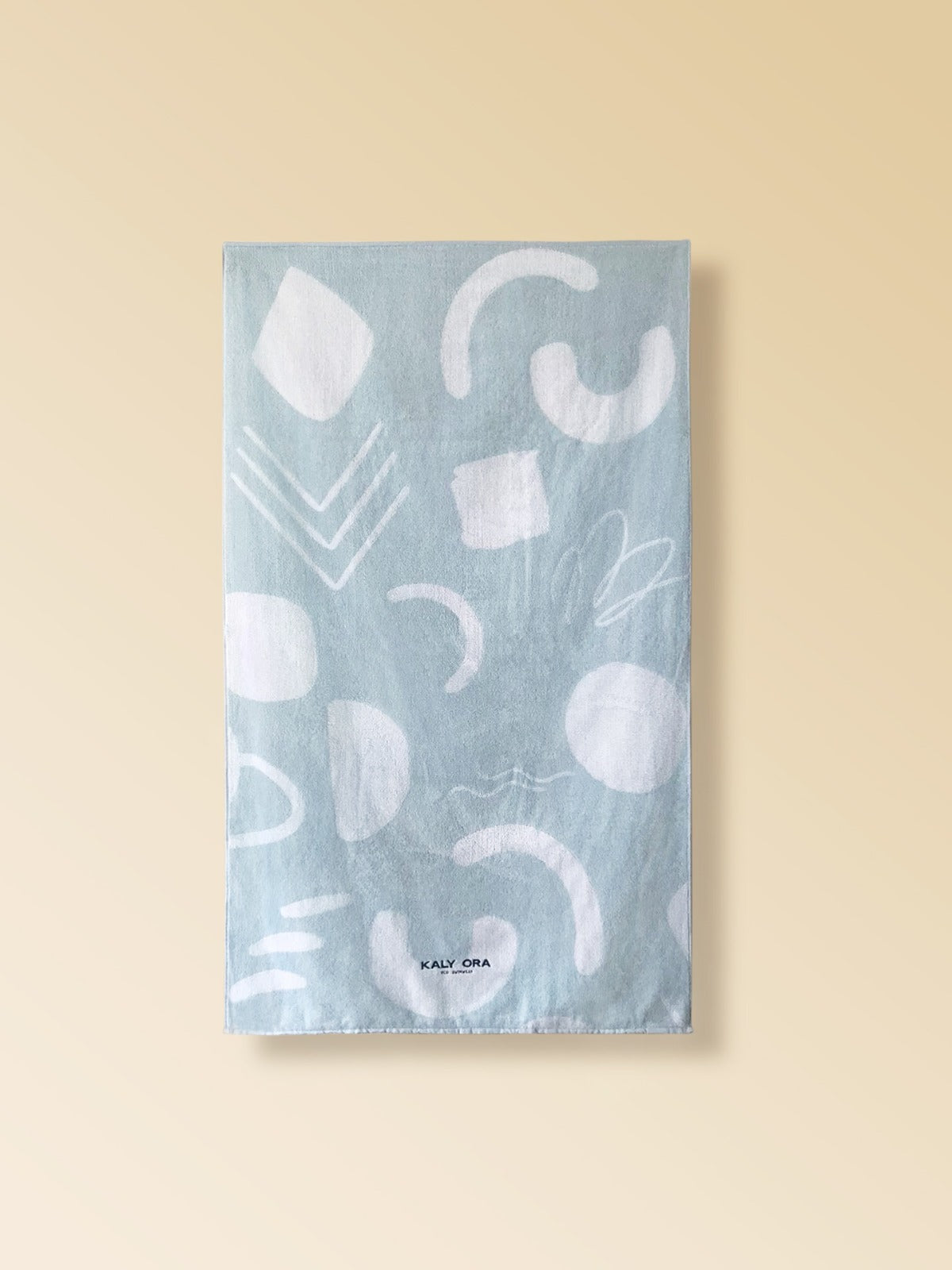 This blue sustainable beach towel is big enough to fit two persons.